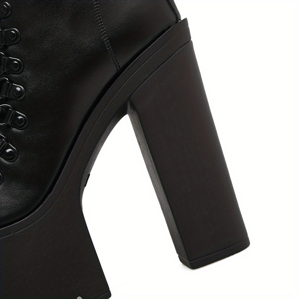 Black platform ankle boots darkwear fashion women side zipper and chunky sole close up