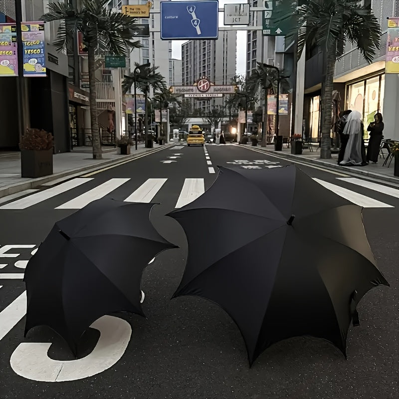 Alternative darkwear batwing umbrella street scene — black canopy dramatic silhouette urban setting XL and L size