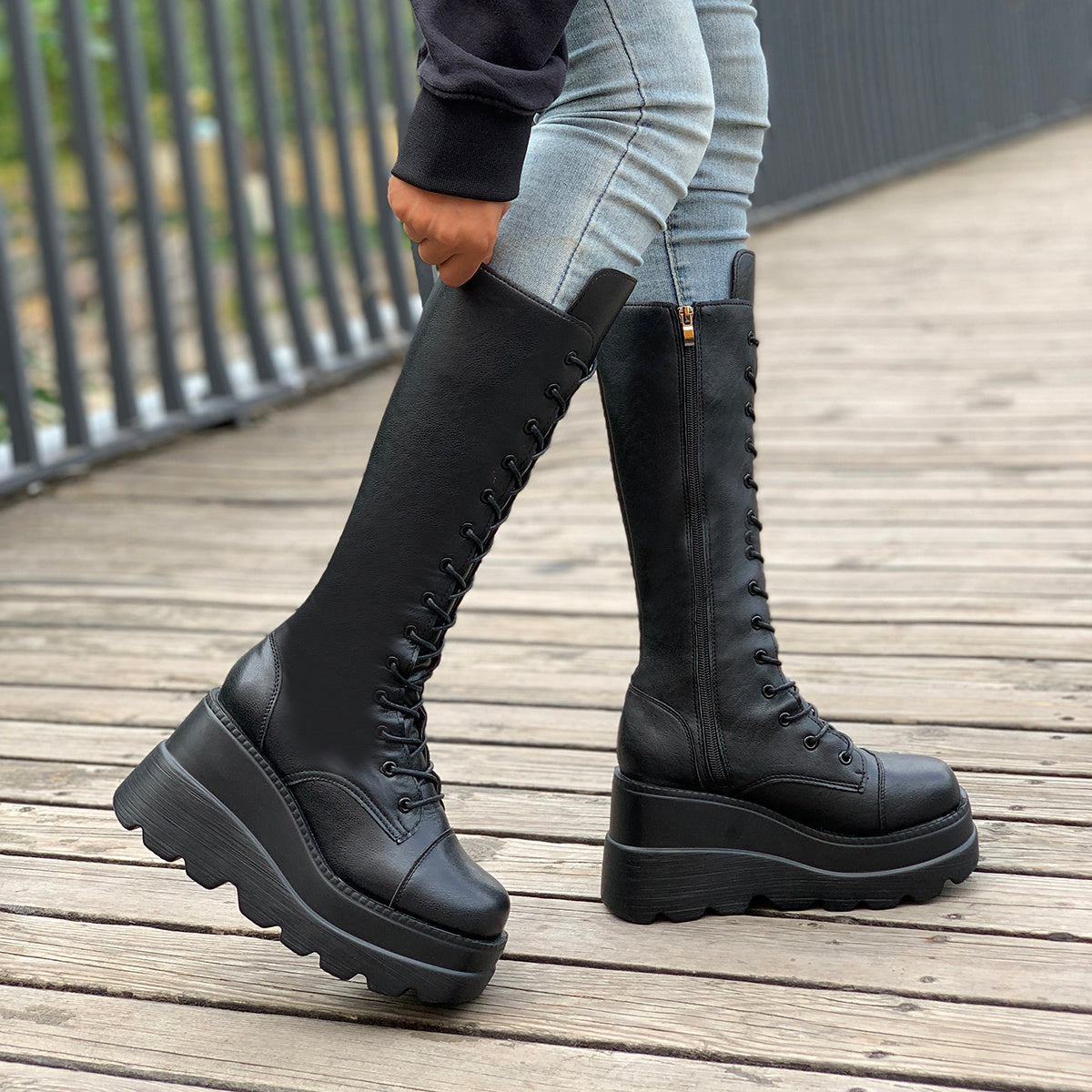 Black lace up knee high boots darkwear fashion women angled view chunky platform sole detail